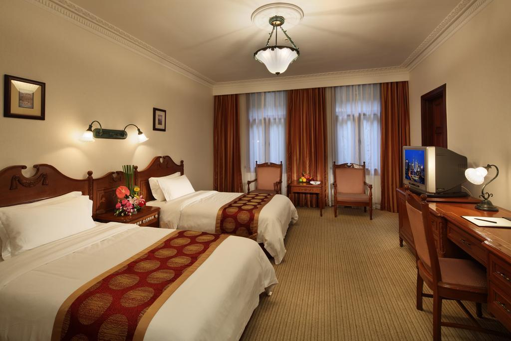Jin Jiang Pacific Hotel Шанхай Екстериор снимка