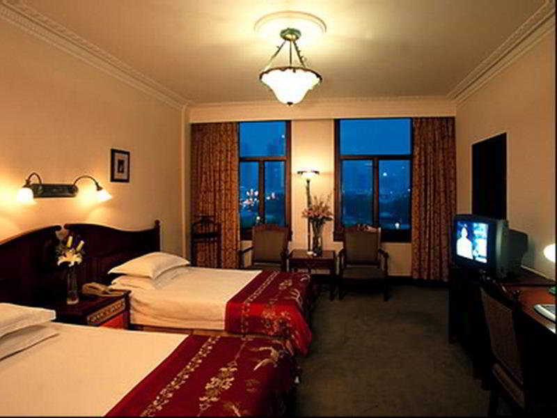 Jin Jiang Pacific Hotel Шанхай Стая снимка