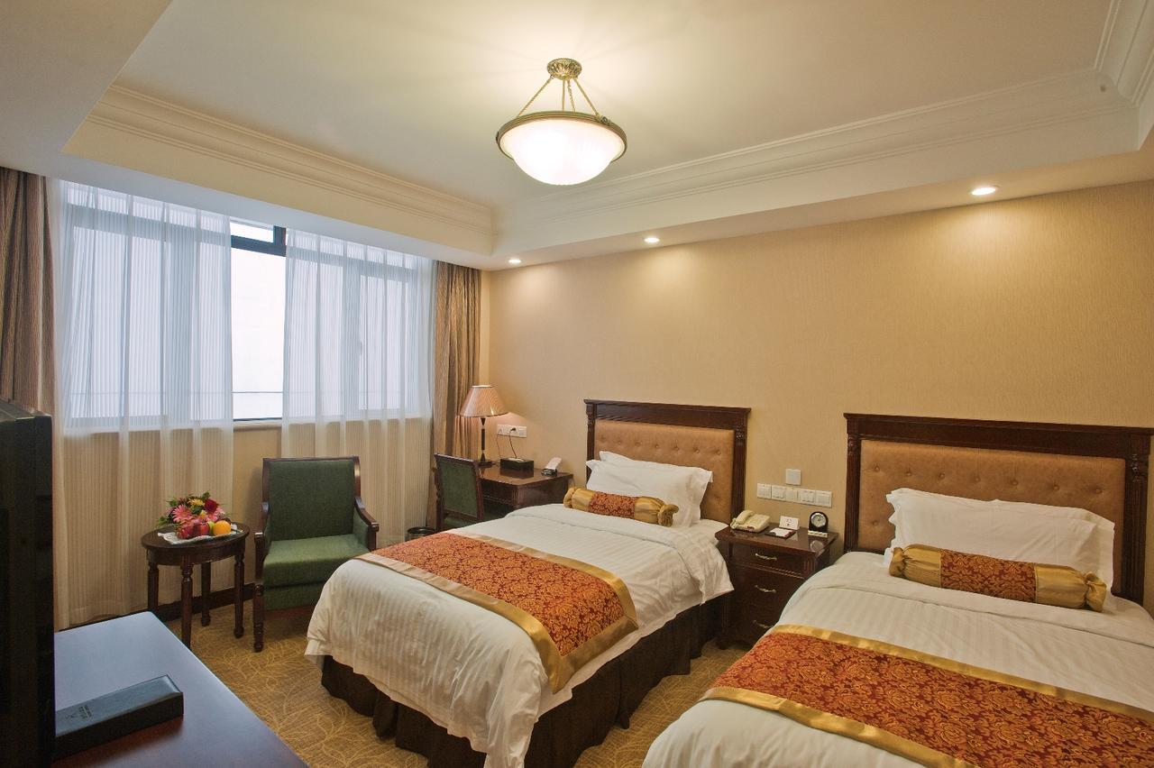 Jin Jiang Pacific Hotel Шанхай Стая снимка
