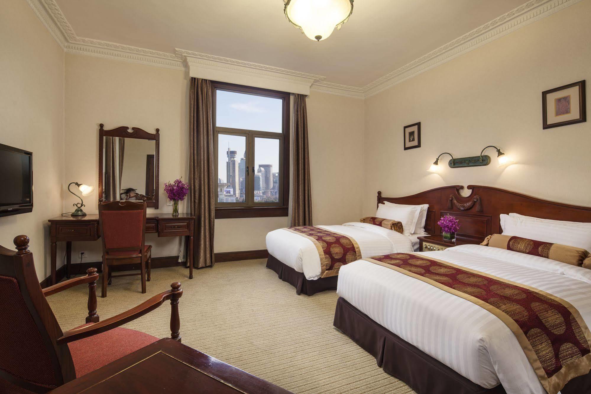 Jin Jiang Pacific Hotel Шанхай Екстериор снимка